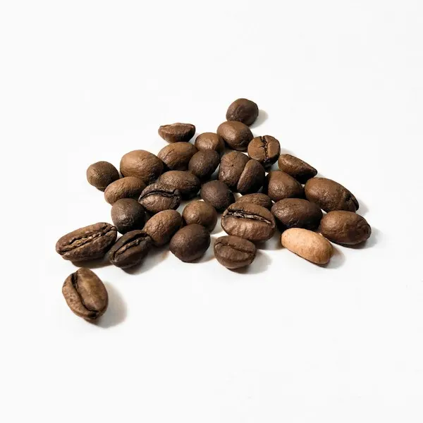 Roasted coffee beans on white